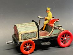 A superb German tinplate clockwork model of a veteran motor car by Marke, bearing the name Hessmobil