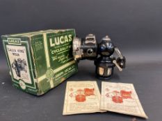 A rare Lucas 'Calcia King' no. 326 lamp in original box, brand new old stock.