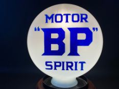 A BP Motor Spirit pill shaped glass petrol pump globe, in superb condition, the best one of these