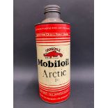 A Gargoyle Mobiloil Arctic Grade quart cylindrical oil can.