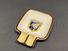 A Leyland tiger porcelain ashtray.