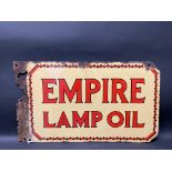 An Empire Lamp Oil double sided enamel sign with flattened hanging flange, 26 x 15".