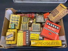A box of motoring packaging and spares.