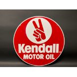 A Kendall Motor Oil circular double sided advertising sign, dated 1990, 23" diameter.