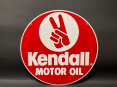 A Kendall Motor Oil circular double sided advertising sign, dated 1990, 23" diameter.