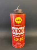 A Shell X-100 Motor Oil cylindrical quart can.