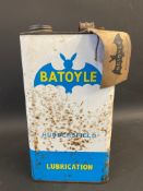 A Batoyle Lubrication gallon can with original paper tag.