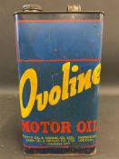 An Ovoline Motor Oil gallon can.
