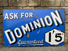 A Dominion Guaranteed rectangular enamel sign by Bruton of London, 48 x 30".