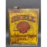 A Shell Lubricating Oil gallon.