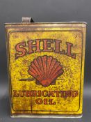 A Shell Lubricating Oil gallon.