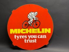 A Michelin 'tyres you can trust' hardboard tyre advertising sign, 25" diameter.