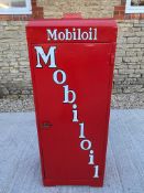 A Mobiloil single door oil cabinet, with domed roof and modern decals.