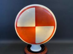 An early and rarely seen Shellmex glass petrol pump globe, of red and white quartered design, very