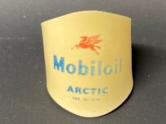 A Mobiloil 'Arctic' plastic oil fountain brand indicator.