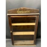 An Eversure front-opening wall mounted dispensing cabinet, 18" wide x 28 1/2" high x 7 1/2" deep.