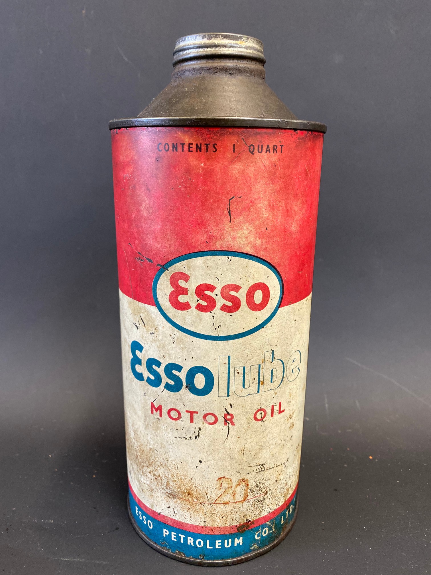 An Essolube Motor Oil cylindrical quart can.