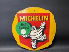 A Michelin High Speed hardboard tyre insert advertising sign, 24 1/2" diameter.