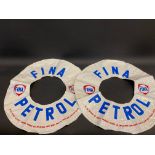 Two Fina promotional rubber rings.
