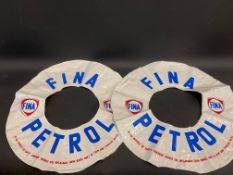 Two Fina promotional rubber rings.