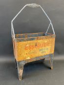 An early Essolube Motor Oil eight division oil bottle crate.