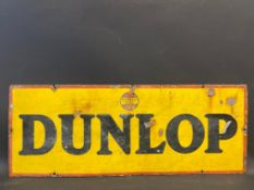 A Dunlop rectangular enamel sign, 30 x 11 1/2".