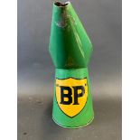 A BP quart measure with unusual shield-shaped decal.