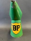 A BP quart measure with unusual shield-shaped decal.