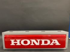 A Honda illuminated lightbox, 28 1/2 x 4".