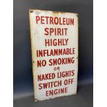 A garage forecourt enamel sign warning of petroleum spirit being highly flammable, 15 x 28".