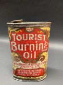 A Tourist Burning Oil oval can.