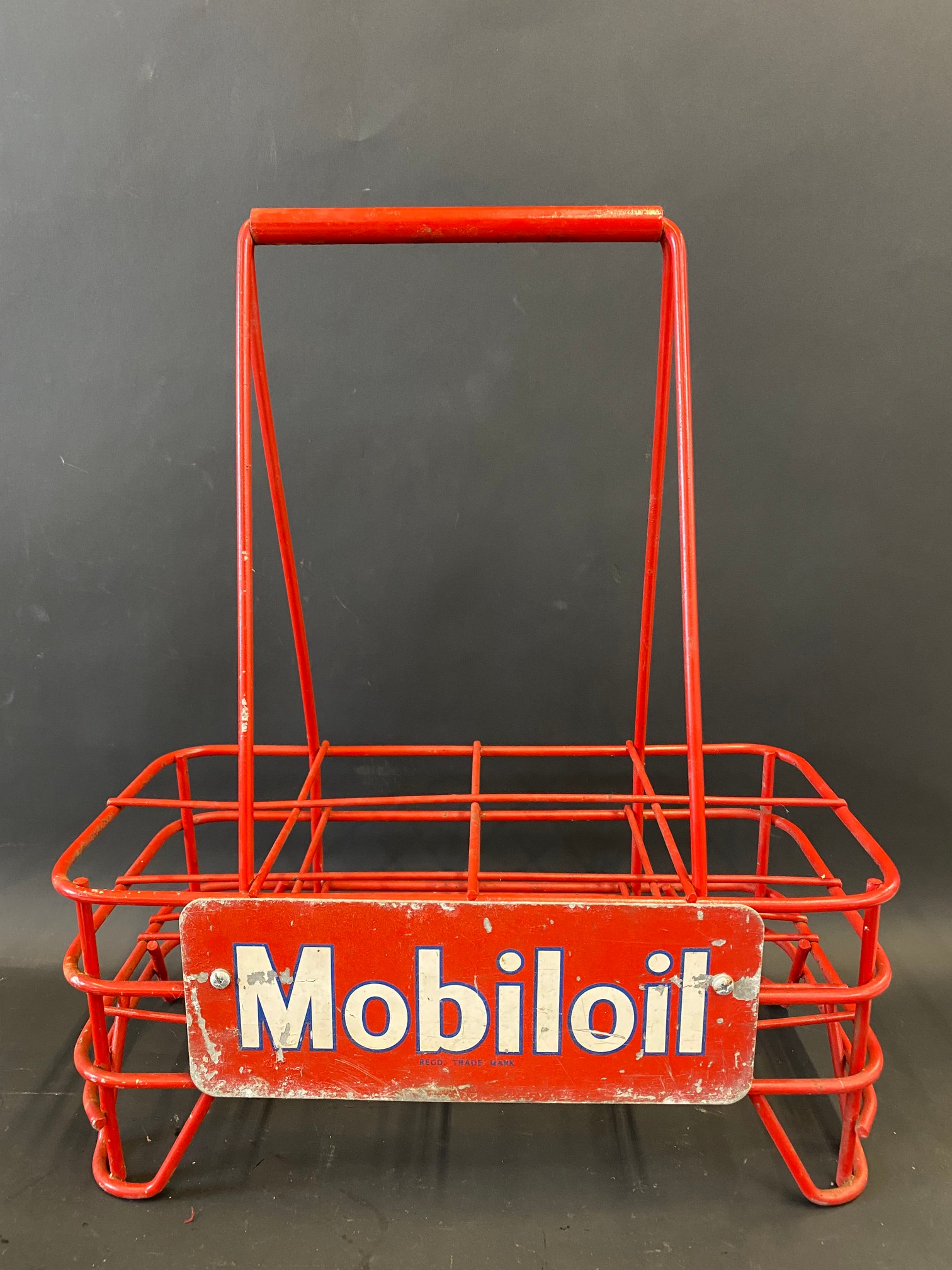 A Mobiloil eight-division oil bottle crate.