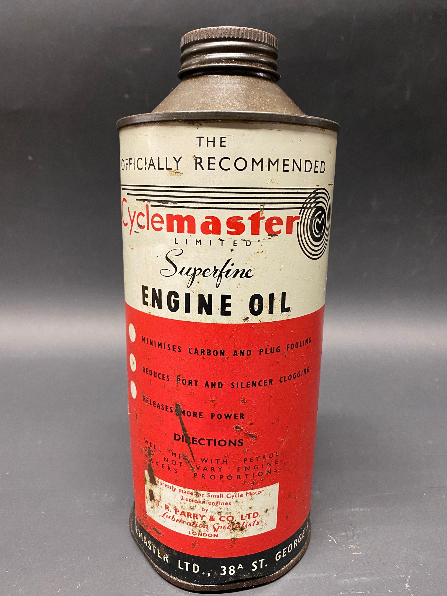 A Cyclemaster Oil cylindrical quart oil can.