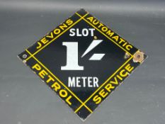 A very rare Jevons Automatic Petrol Service lozenge shaped double sided enamel sign for a self-