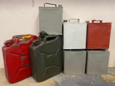 Five two-gallon petrol cans including Shellmex Motor Spirit plus two jerry cans.
