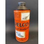 A Delco Shock Absorber Oil cylindrical quart can.