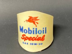 A Mobiloil 'Special' plastic oil fountain brand indicator.