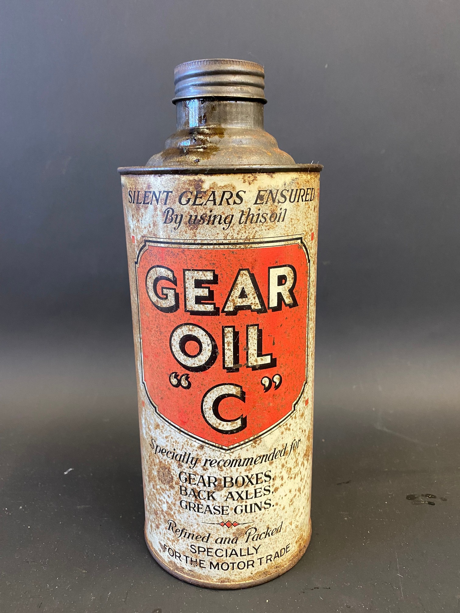A Gear Oil 'C' quart cylindrical oil can.