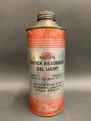 A Gargoyle Shock Absorber Oil quart cylindrical oil can.