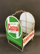 A Wakefield Castrol Motor Oil nine-division crate with four enamel signs attached.