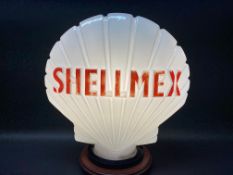 A Shellmex glass petrol pump globe by Hailware, chips to neck.