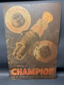 A Champion spark plugs pictorial tin advertising sign, 24 x 36".
