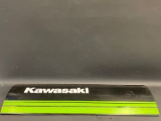 A Kawasaki showroom sign, 39 1/4 x 12 1/4".