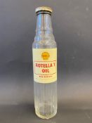 A Shell Rotella T Oil glass bottle.