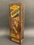 An early Dunlop Long Outfit wall mounted wooden puncture repair outfit dispenser, 15" high.