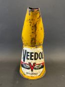 A Veedol quart measure.