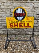 A 'Stop & Fill Up Here with Shell' double sided enamel sign, on a can stand, restored.