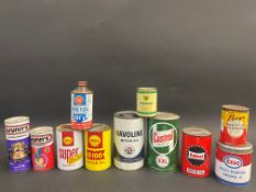 A box of assorted later issue oil cans, some still with contents including Shell.