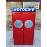 A Motorine two door oil cabinet, with original Motorine tin chart sign attached to the inside of the