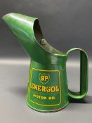 A BP Energol Motor Oil pint measure in excellent condition, unusually with three decals, dated 1958.